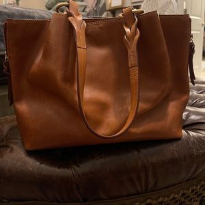 Dooney and Bourke Large Zip Barlow, only used for one week. Small stain.